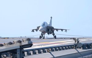 â€˜Historic milestoneâ€™: LCA and MiG-29K fighters begin flight trials from INS Vikrant